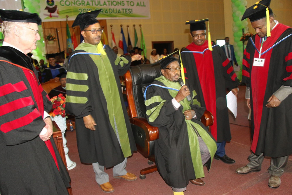 President of Oklahoma State University Dr. Burns Hargis, Prime Minister Haile Mariam Desalegn and Dr. Jemal Yousuf on graduation ceremony