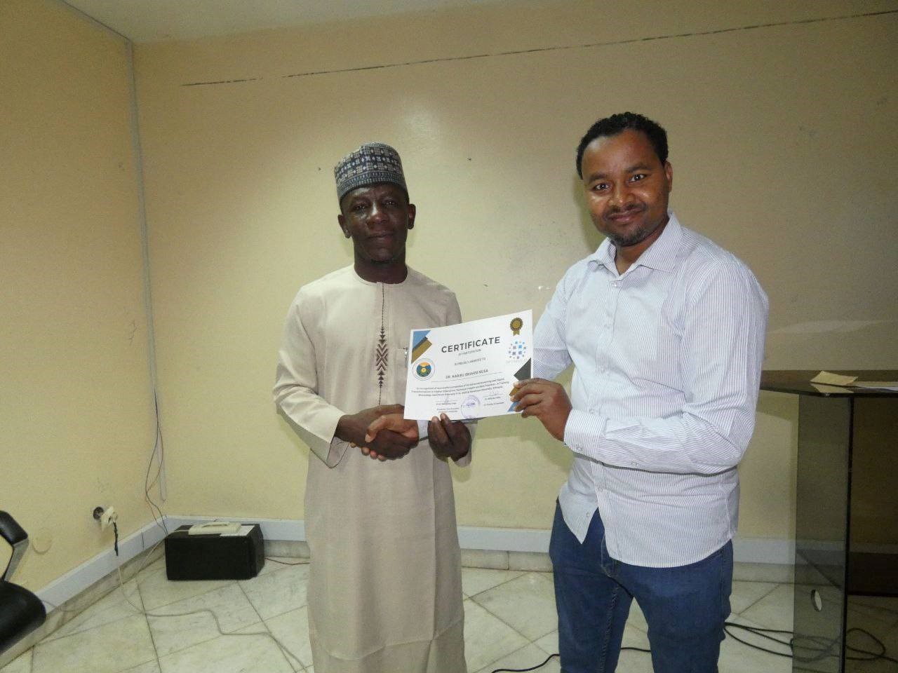 Dr. Kebir Ibrahim and Dr. Abdi Mohammed at Certification