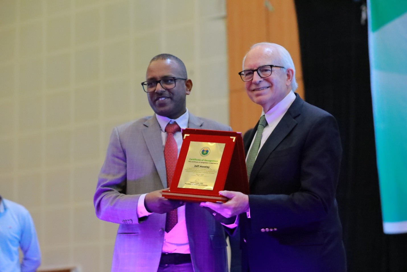 Dr. Jemal Yousuf and Jeff Moseley at awards in recognition